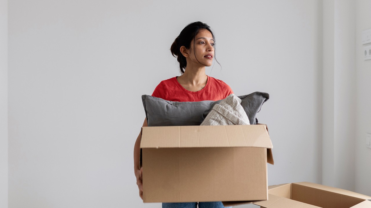woman with moving boxes